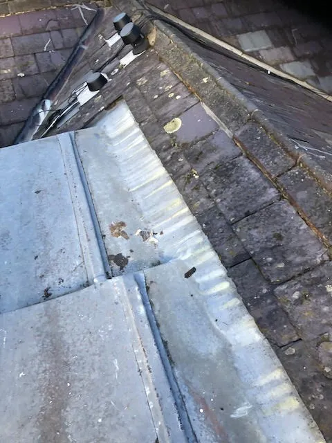 An old lead flat roof and it being replaced — photo 6