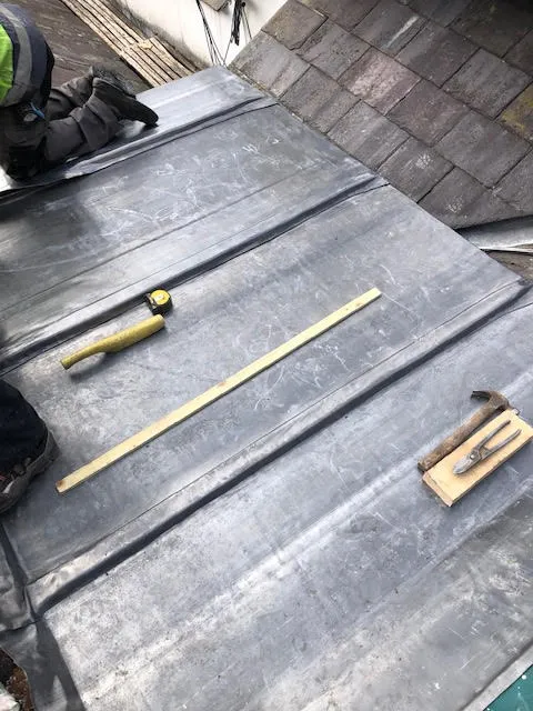 An old lead flat roof and it being replaced — photo 7