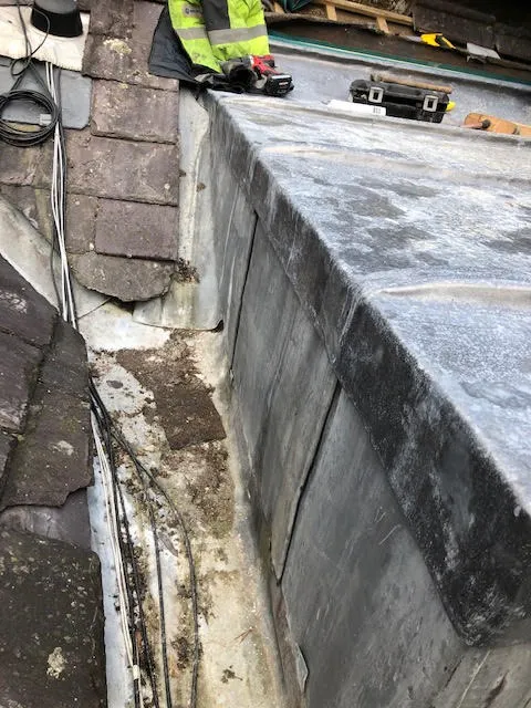 An old lead flat roof and it being replaced — photo 9
