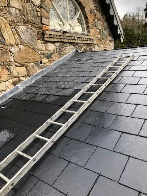 Badly leaking roof being replaced — photo 8