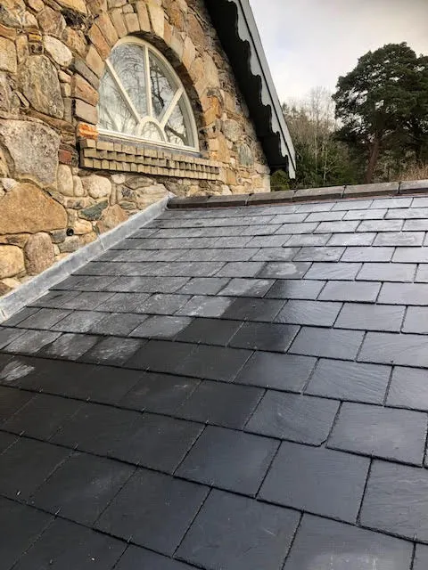 Badly leaking roof being replaced — photo 9
